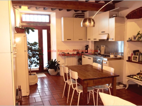 gourgeous appartment with vaulted ceilings and exposed bricks